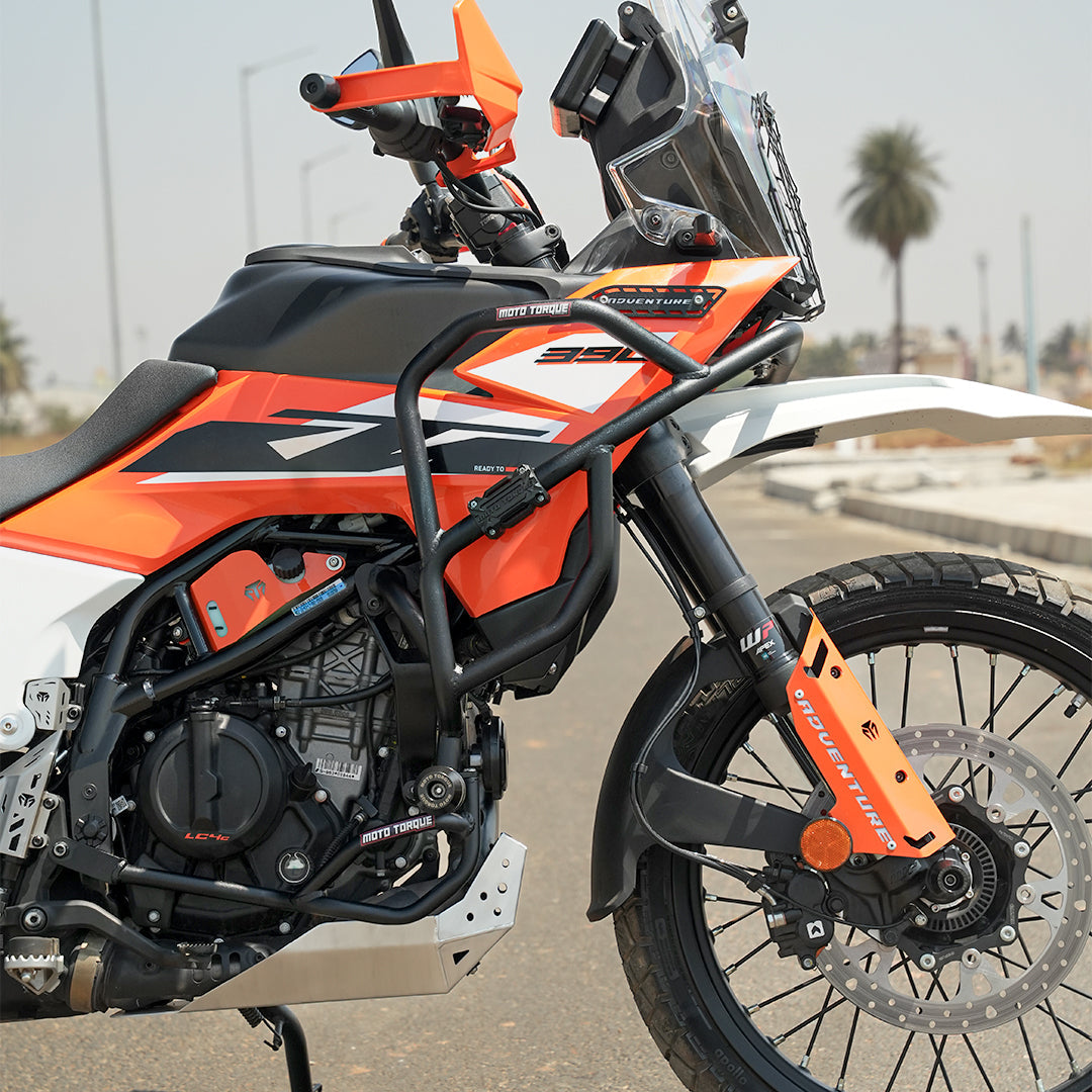 Black Crash Guard for KTM 250 Adventure / KTM 390 Adventure / Adventure X – Heavy-Duty Mild Steel with X-Protect Polymer Sliders BLACK & ORANGE